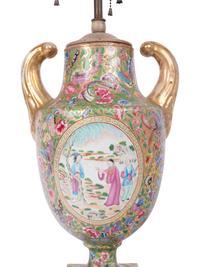 A Chinese Export Parcel Gilt and Faux Marble Decorated Famille Rose Porcelain Pistol-Handled Urn