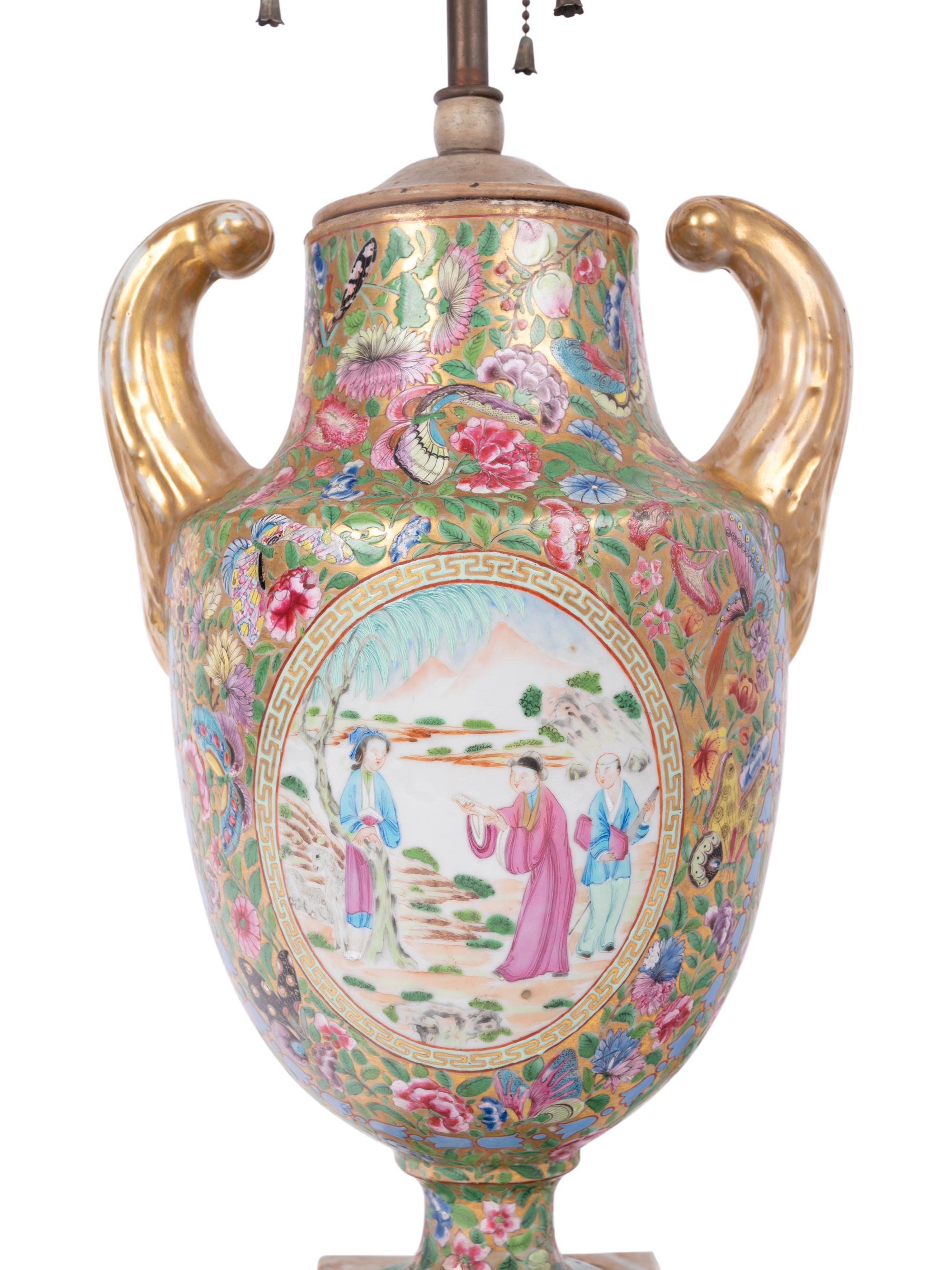 A Chinese Export Parcel Gilt and Faux Marble Decorated Famille Rose Porcelain Pistol-Handled Urn