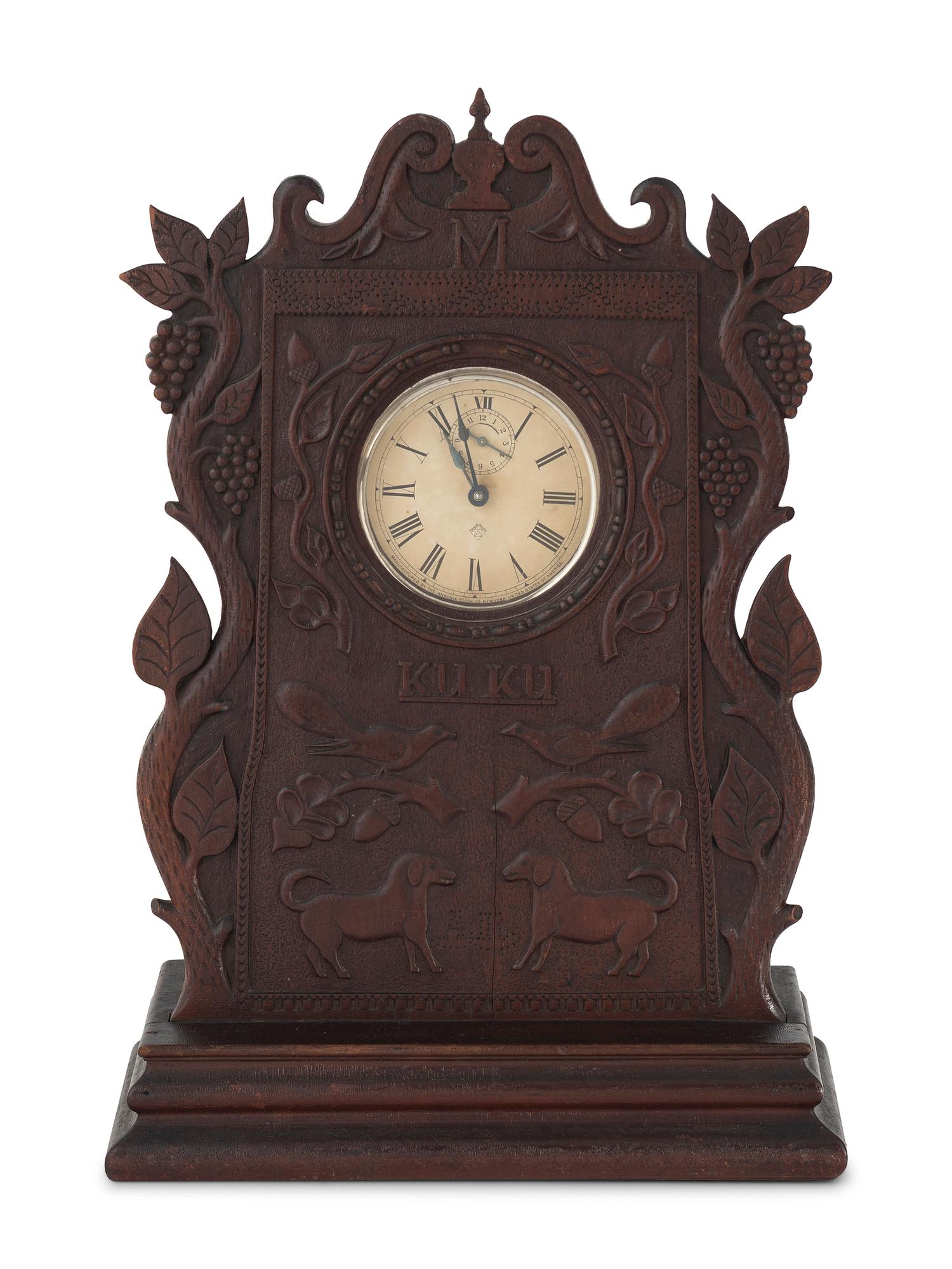 A Carved Walnut Folk Art Clock Hutch
