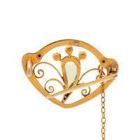 ART NOUVEAU, YELLOW GOLD, PERIDOT AND SEED PEARL BROOCH