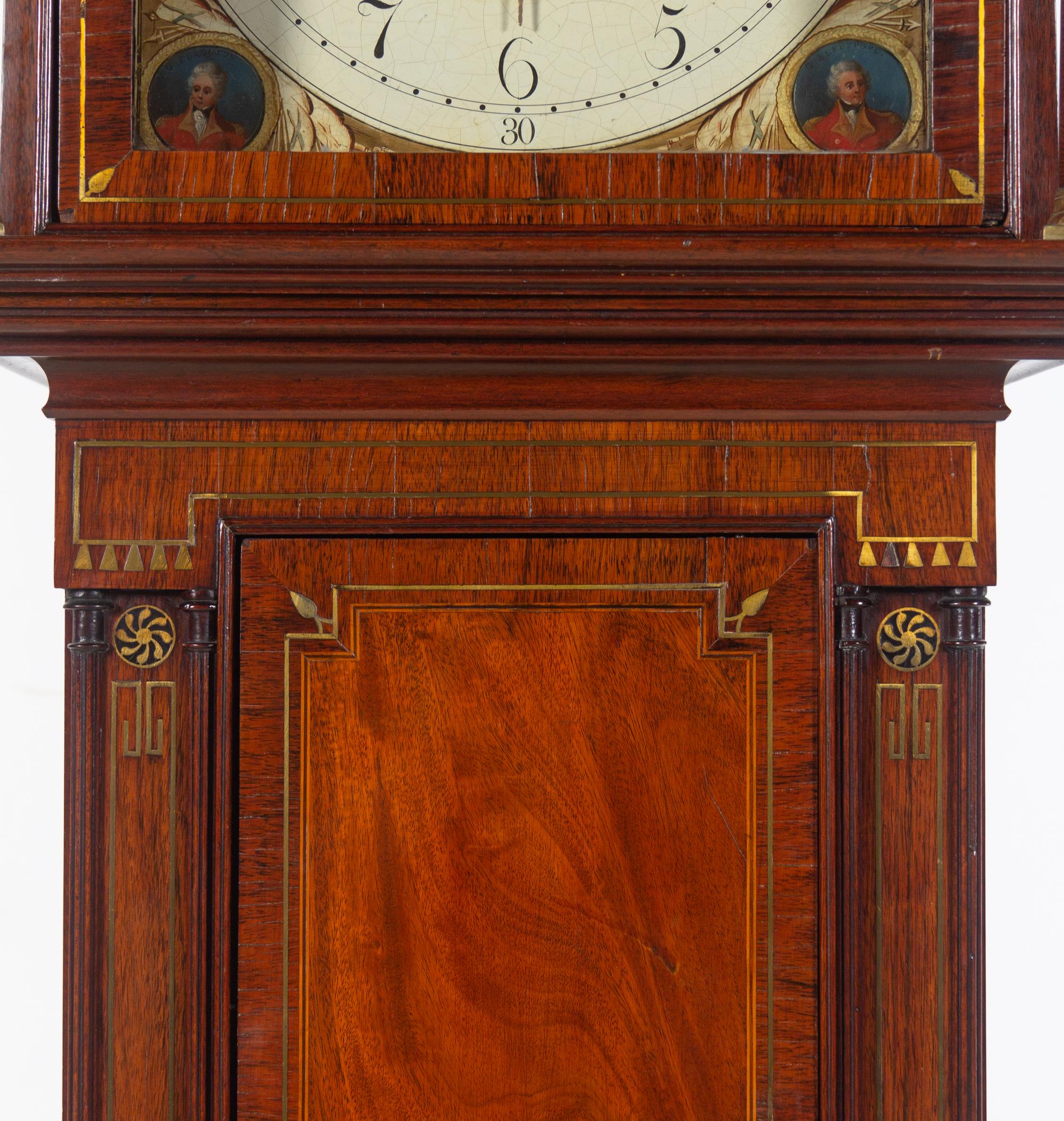 A Regency Brass Inlaid Mahogany Longcase Clock with an Animated Dial