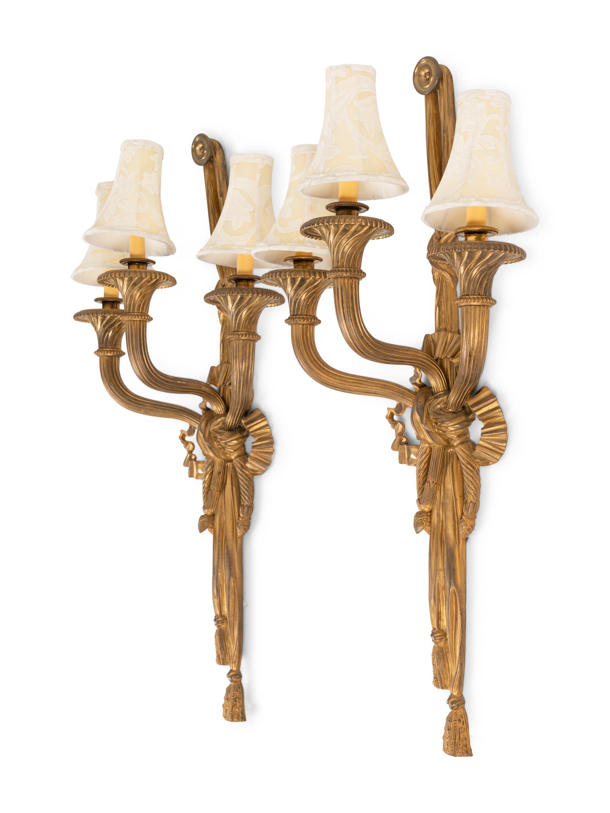 A Pair of Louis XVI Style Gilt Bronze Three-Light Sconces