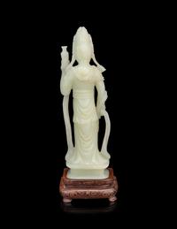 A Pale Celadon Jade Figure of Standing Guanyin