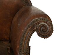 A Spanish Baroque Carved Walnut Leather-Upholstered Sofa — 17TH/18TH CENTURY