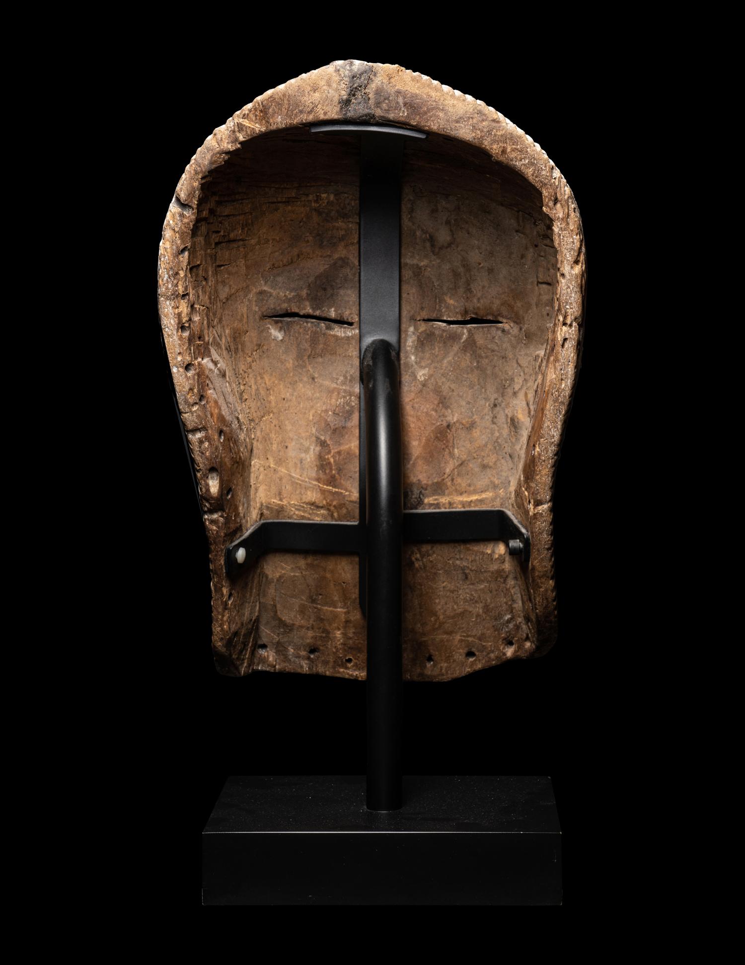 A Songye Wood Female Mask (Kifwebe)