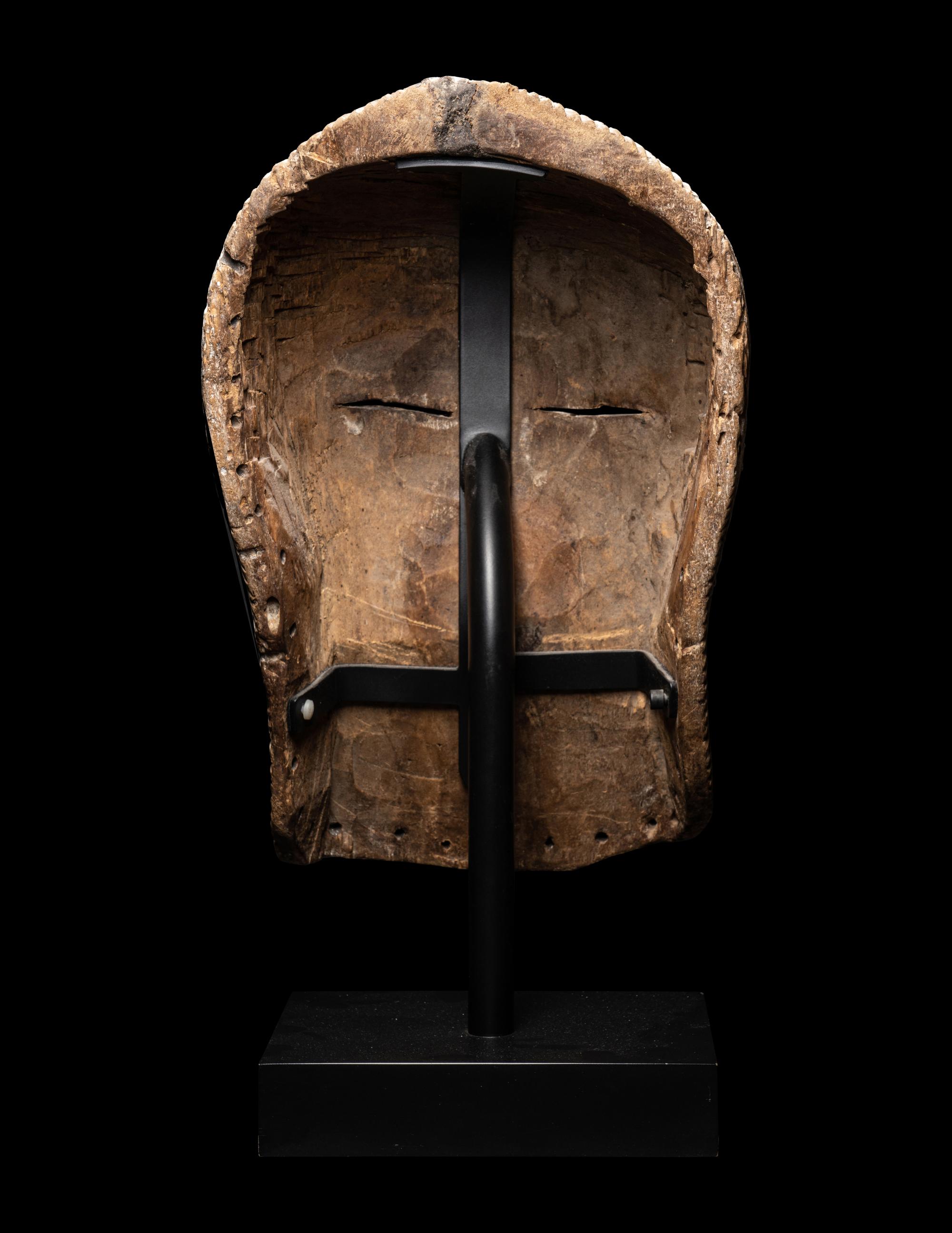 A Songye Wood Female Mask (Kifwebe)
