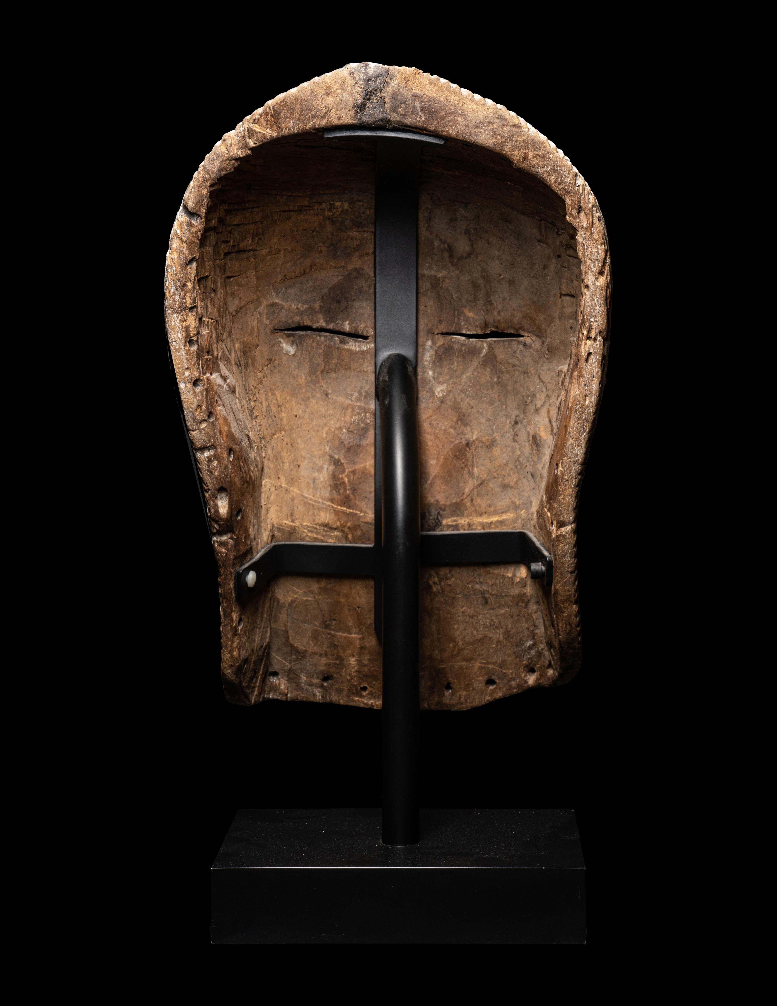 A Songye Wood Female Mask (Kifwebe)