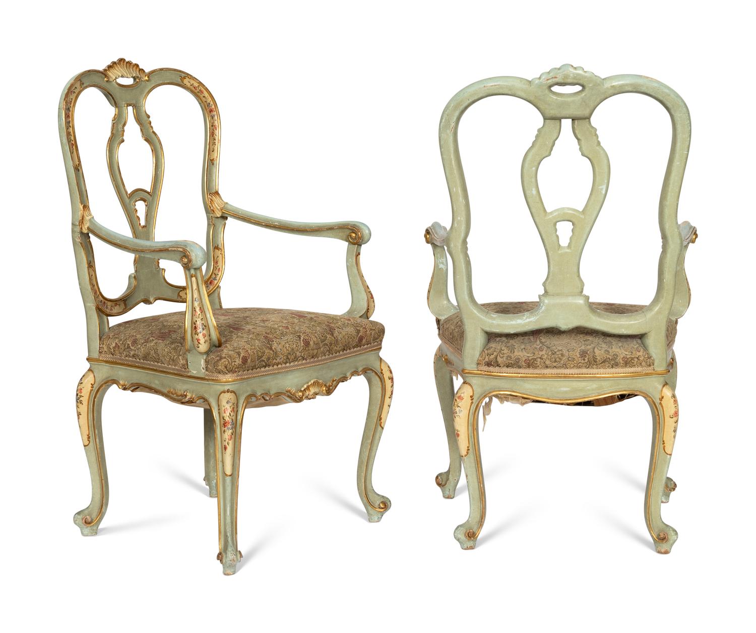 A Pair of Italian Rococo Style Painted and Parcel Gilt Armchairs