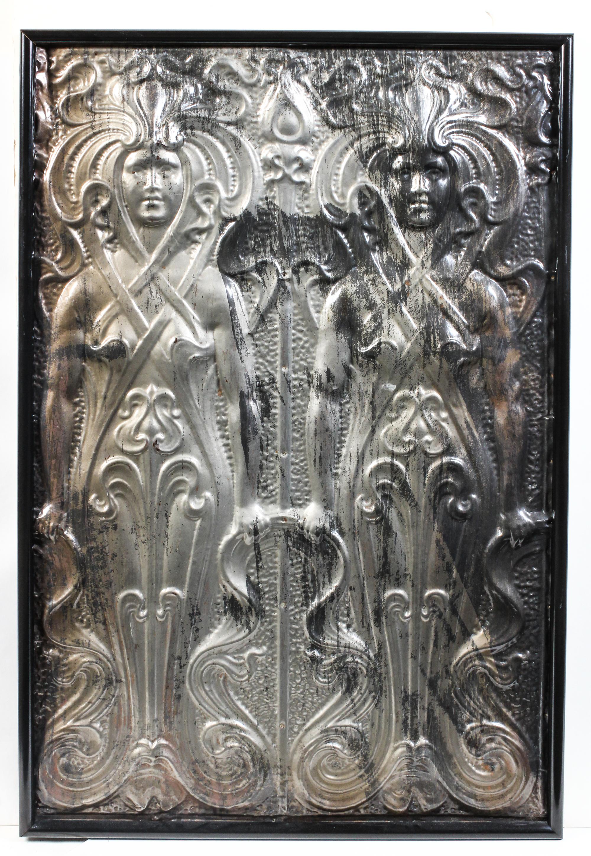 A Pressed Tin Architectural Panel Height 35 3/4 x width 23 1/2 inches. — FIRST HALF 20TH CENTURY
