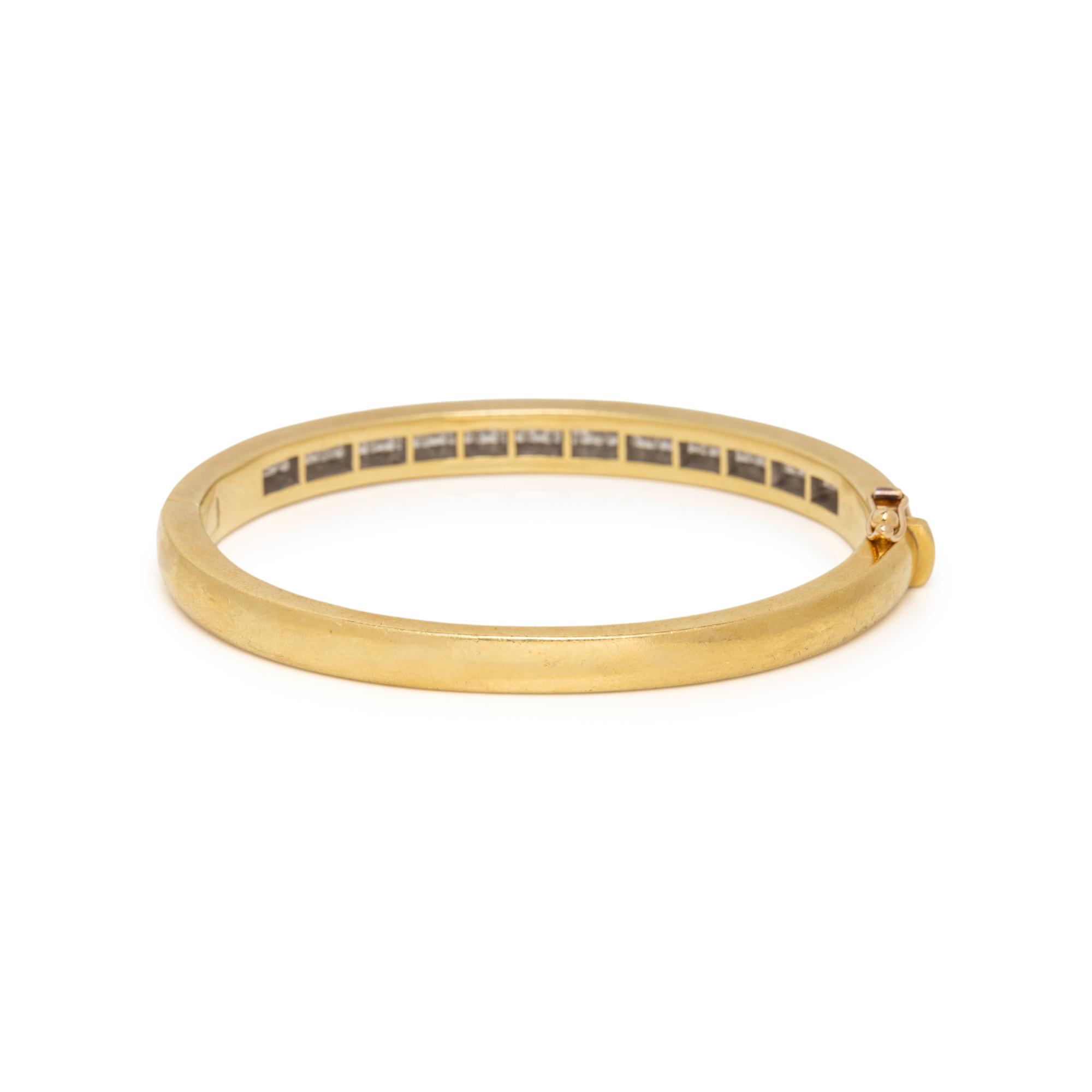 TIFFANY & CO., YELLOW GOLD AND PRINCESS CUT DIAMOND BANGLE BRACELET