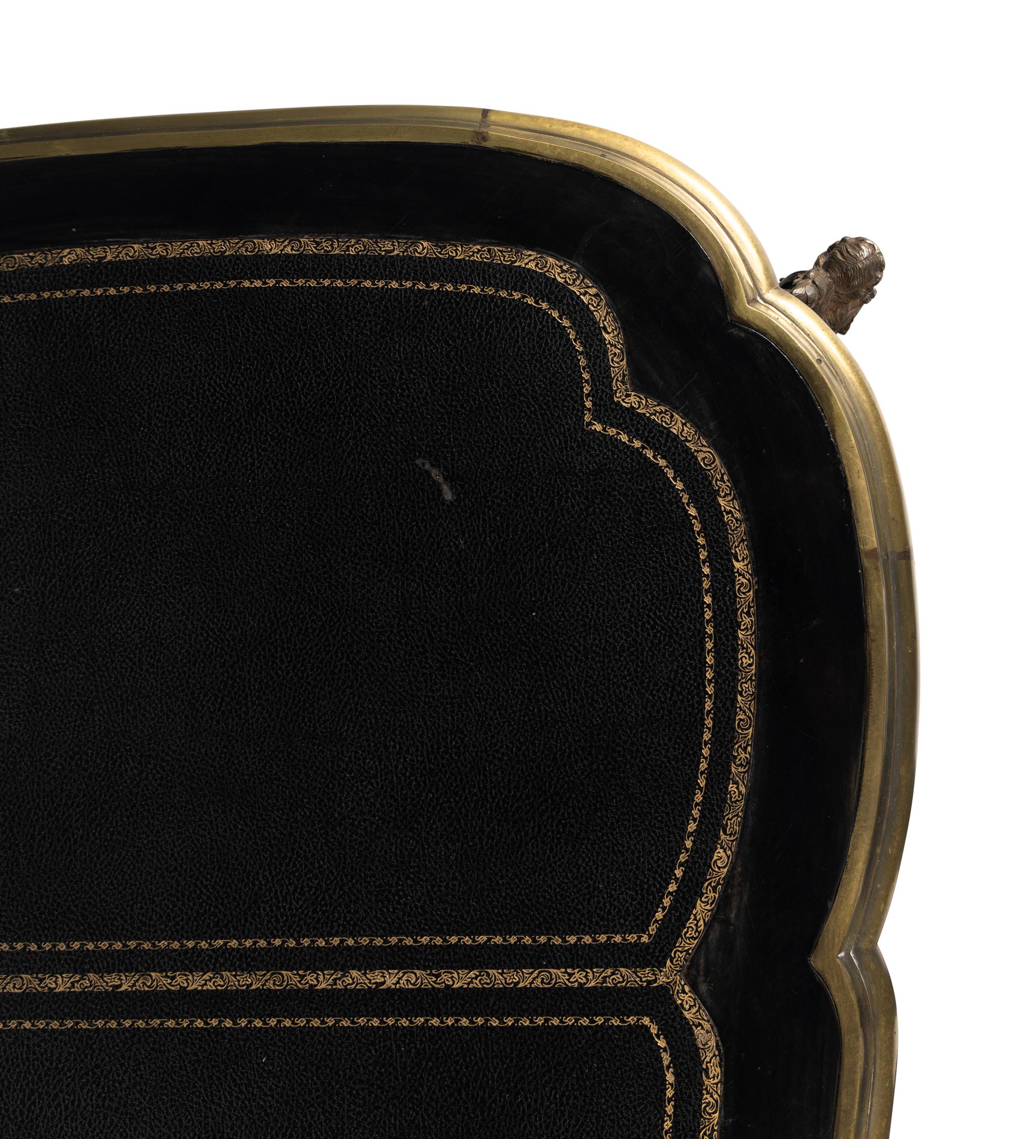 A Louis XV Style Gilt-Metal Mounted Ebonized Bureau Plat
