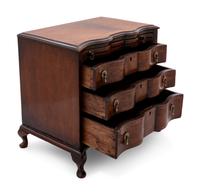 A Continental Walnut Diminutive Chest of Drawers or Salesman's Model