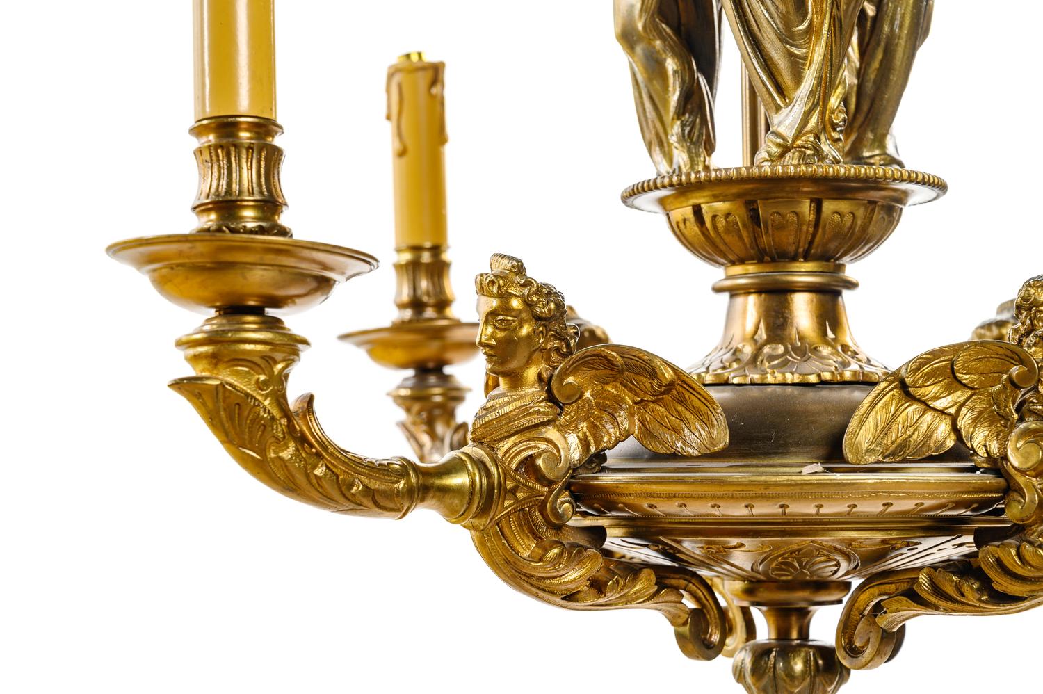 An Empire Style Gilt Bronze Figural Four-Light Chandelier