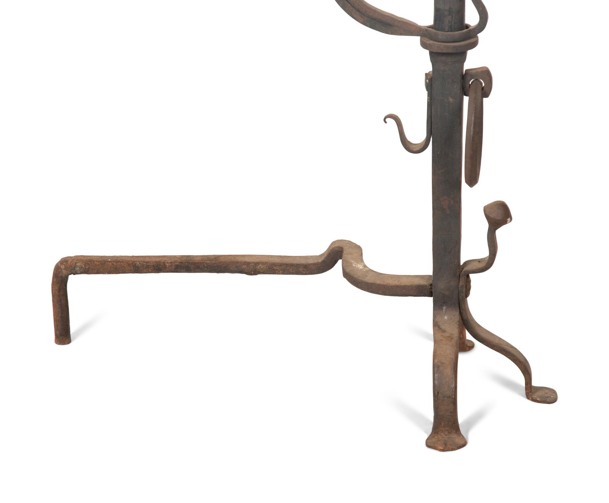 A Pair of Continental Iron Large Andirons — 19TH CENTURY