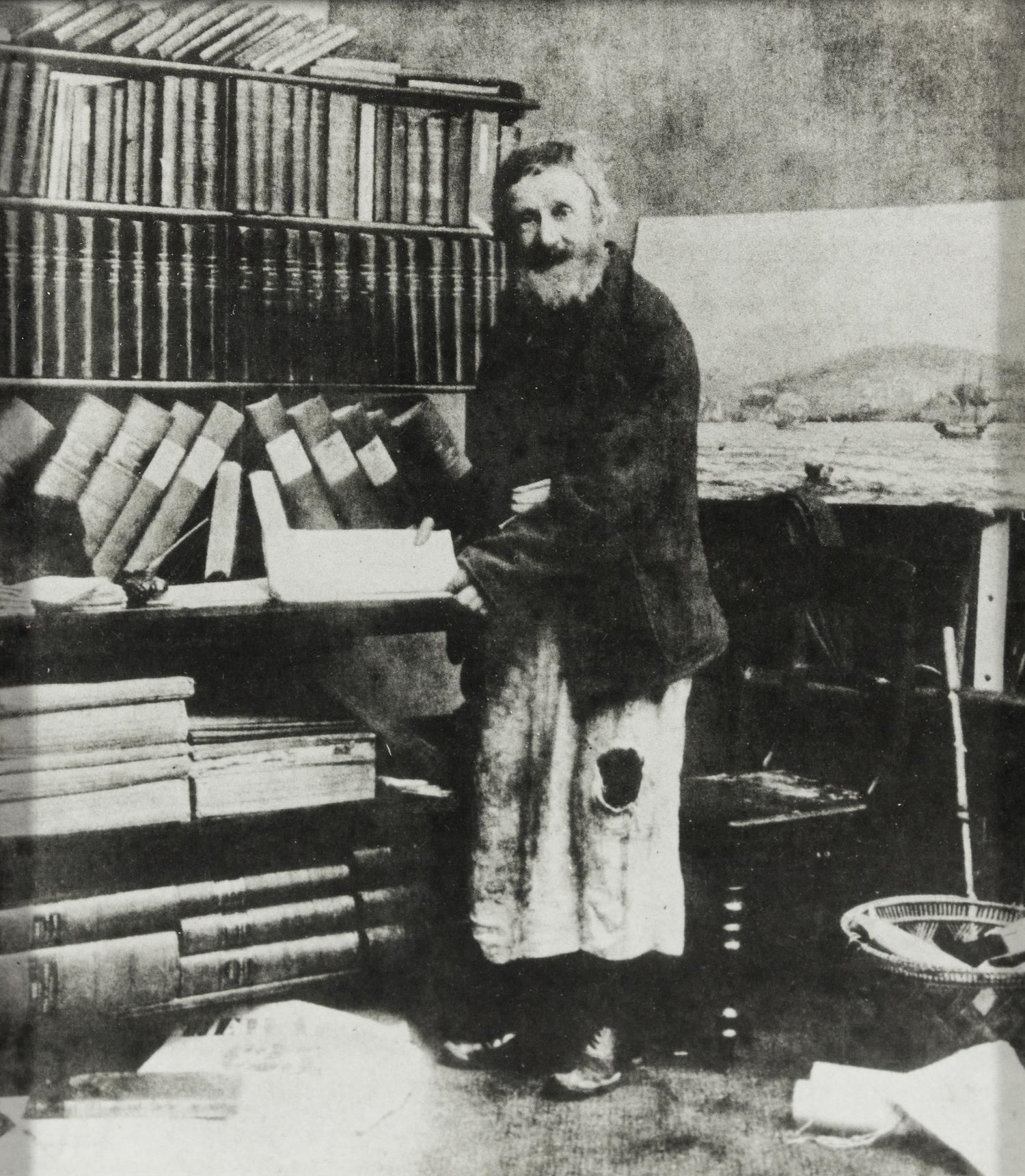 [BIBLIOGRAPHY & BOOKS ABOUT BOOKS]. A group of 13 portraits of booksellers, images of libraries, bookplates, and other book ephemera.