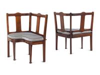 A Pair of George III Provincial Mahogany Corner Seats