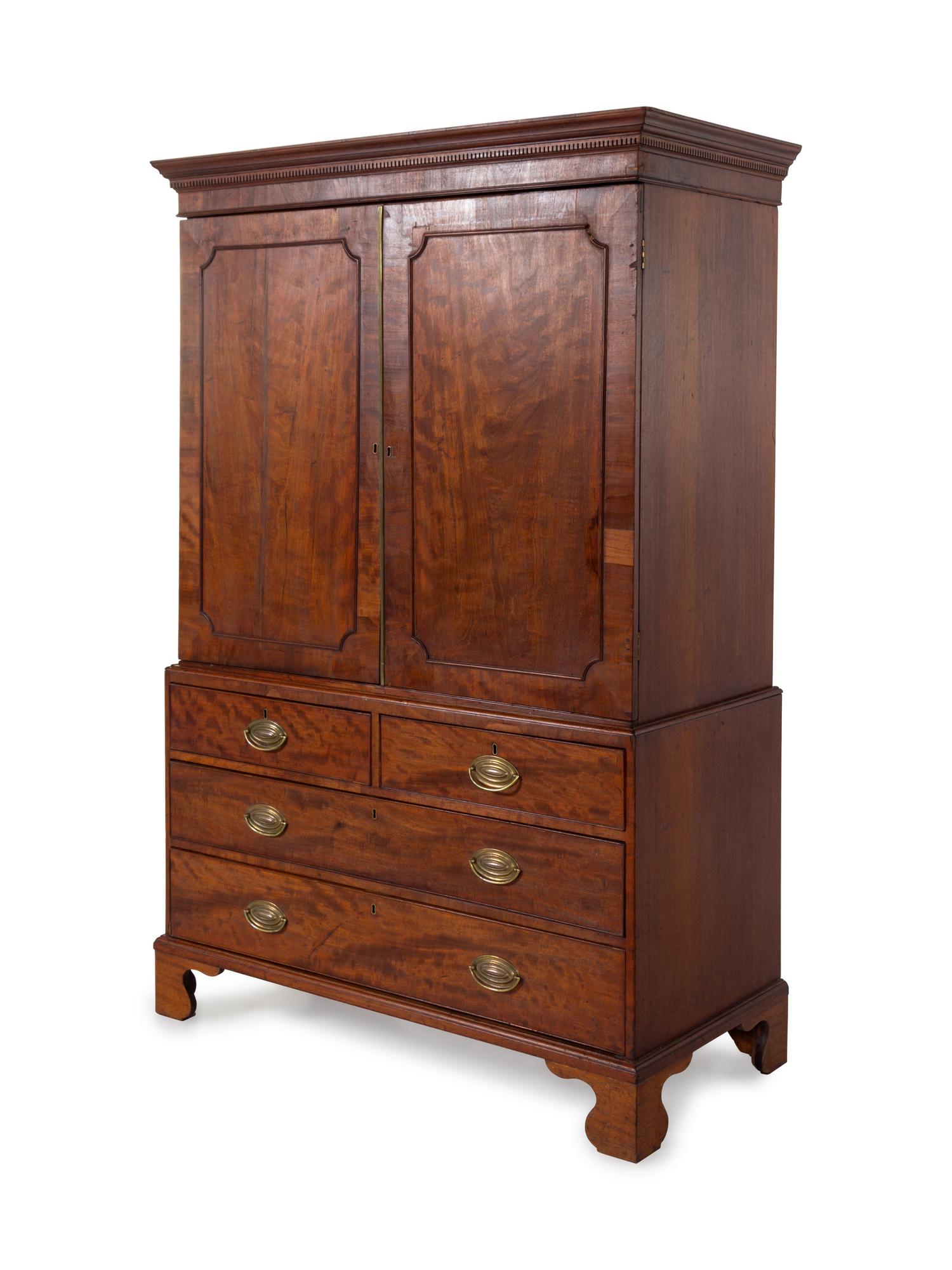 A George III Style Figured Mahogany Linen Press