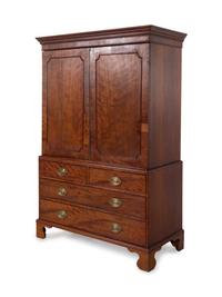 A George III Style Figured Mahogany Linen Press