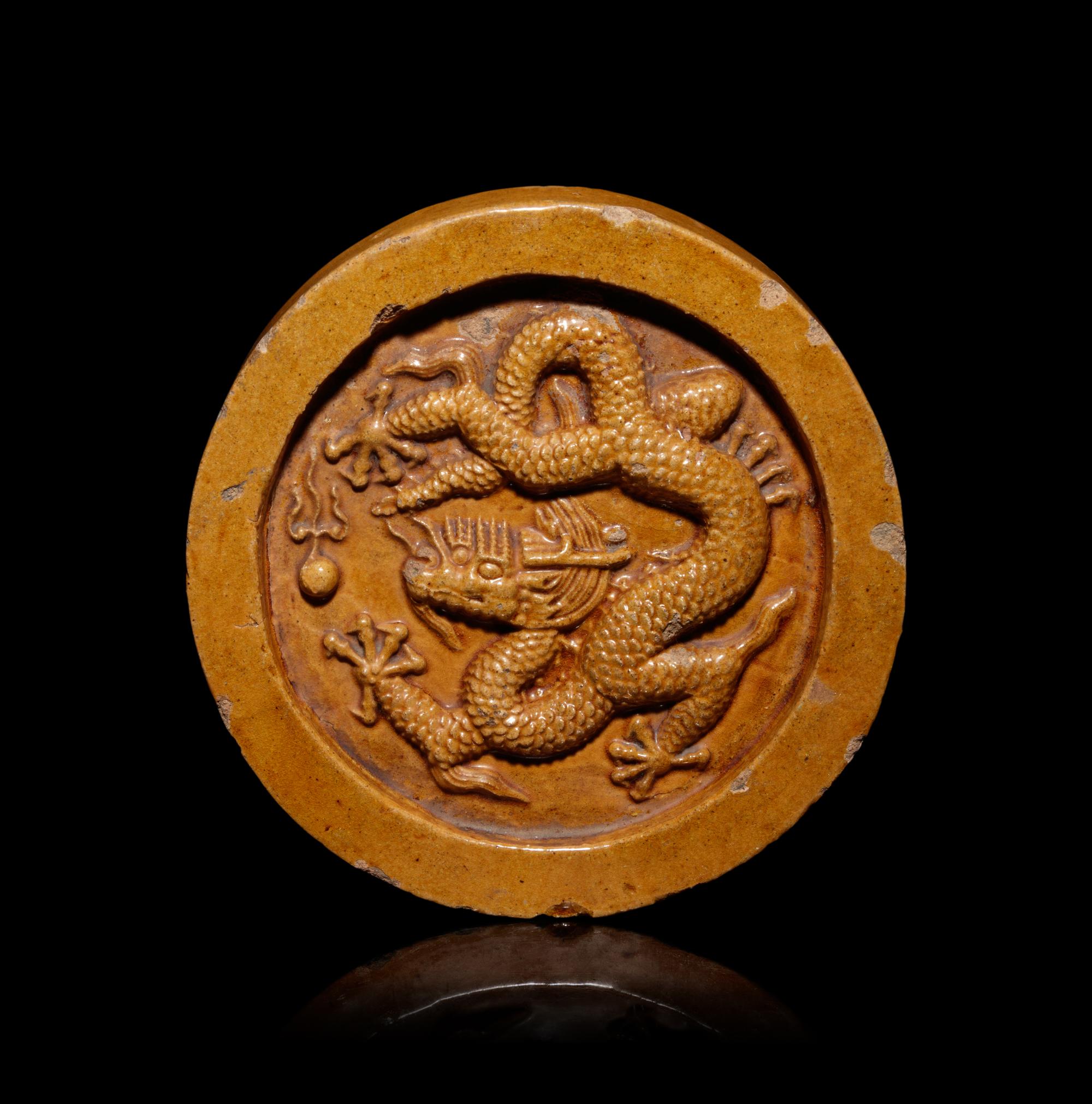 A Chinese Yellow Glazed ‘Dragon’ Roof Tile