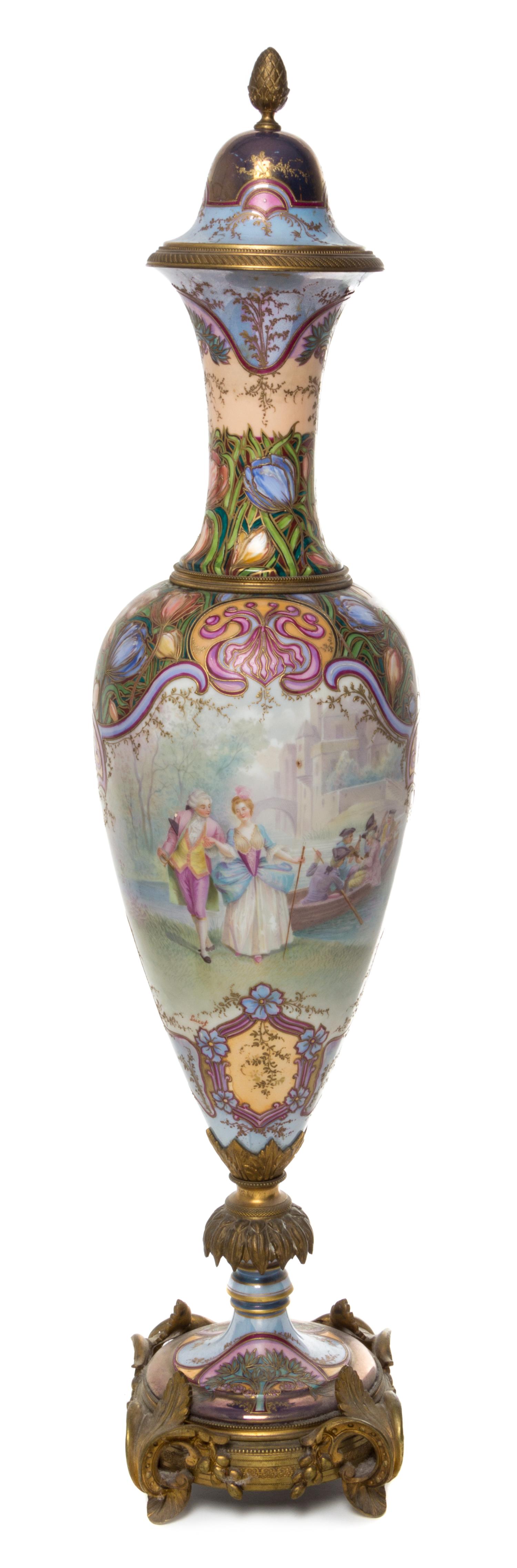 A Sevres Gilt Bronze Mounted Porcelain Urn Height 32 inches.