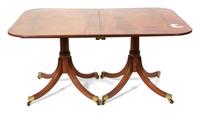 A Regency Style Two Pedestal Mahogany Dining Table Height 28 1/2 x width 59 3/4 x depth 42 1/4 inches. — EARLY 20TH CENTURY