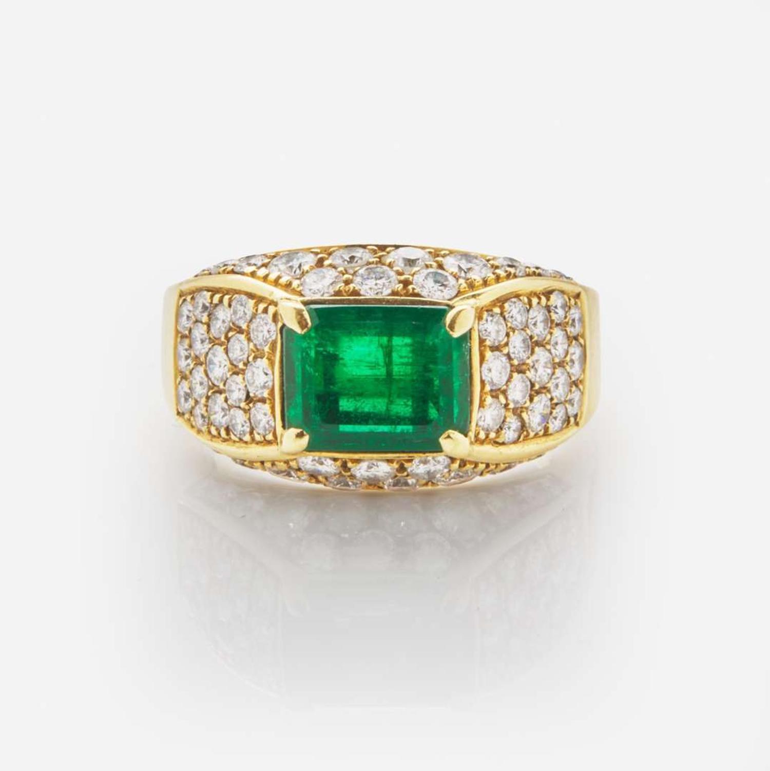 An 18K Yellow Gold, Diamond, and Emerald Ring