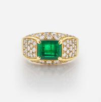 An 18K Yellow Gold, Diamond, and Emerald Ring