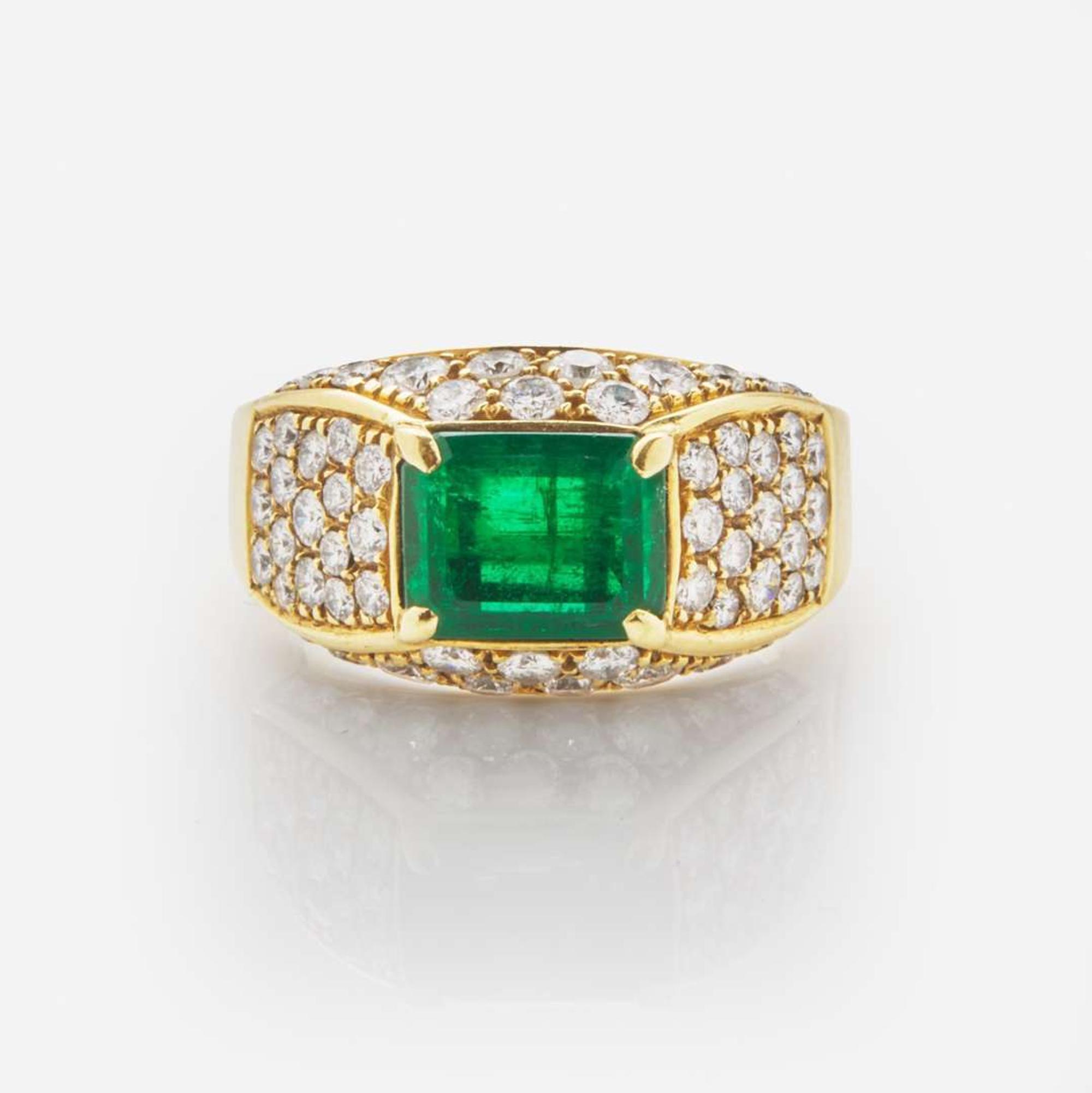 An 18K Yellow Gold, Diamond, and Emerald Ring