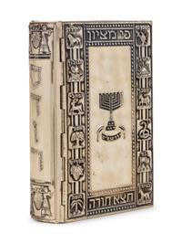 A Silvered Metal Covered Hebrew/English Prayer Book