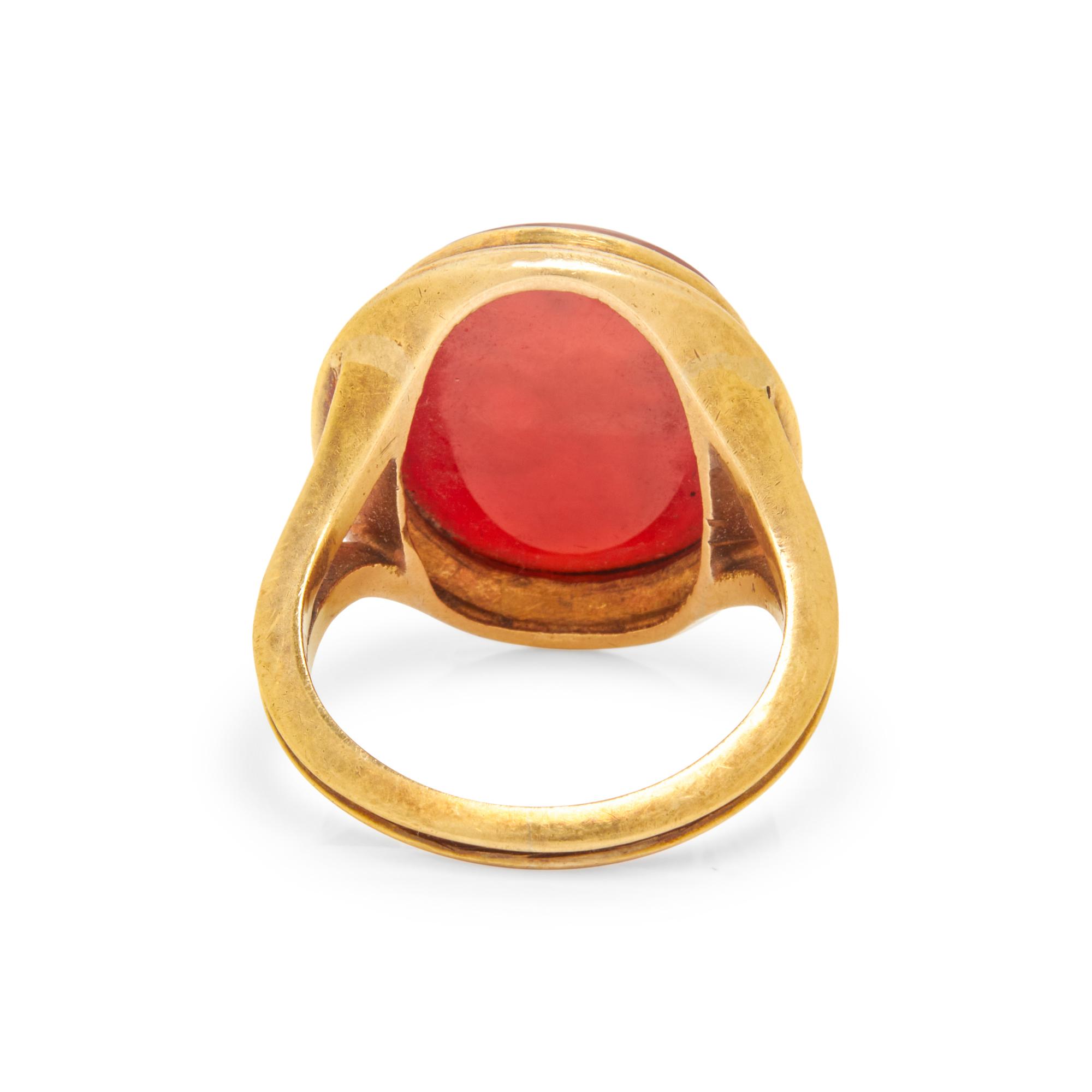 YELLOW GOLD AND CARVED CARNELIAN INTAGLIO RING