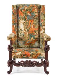A Jacobean Style Wingback Armchair Height 50 inches. — 19TH CENTURY
