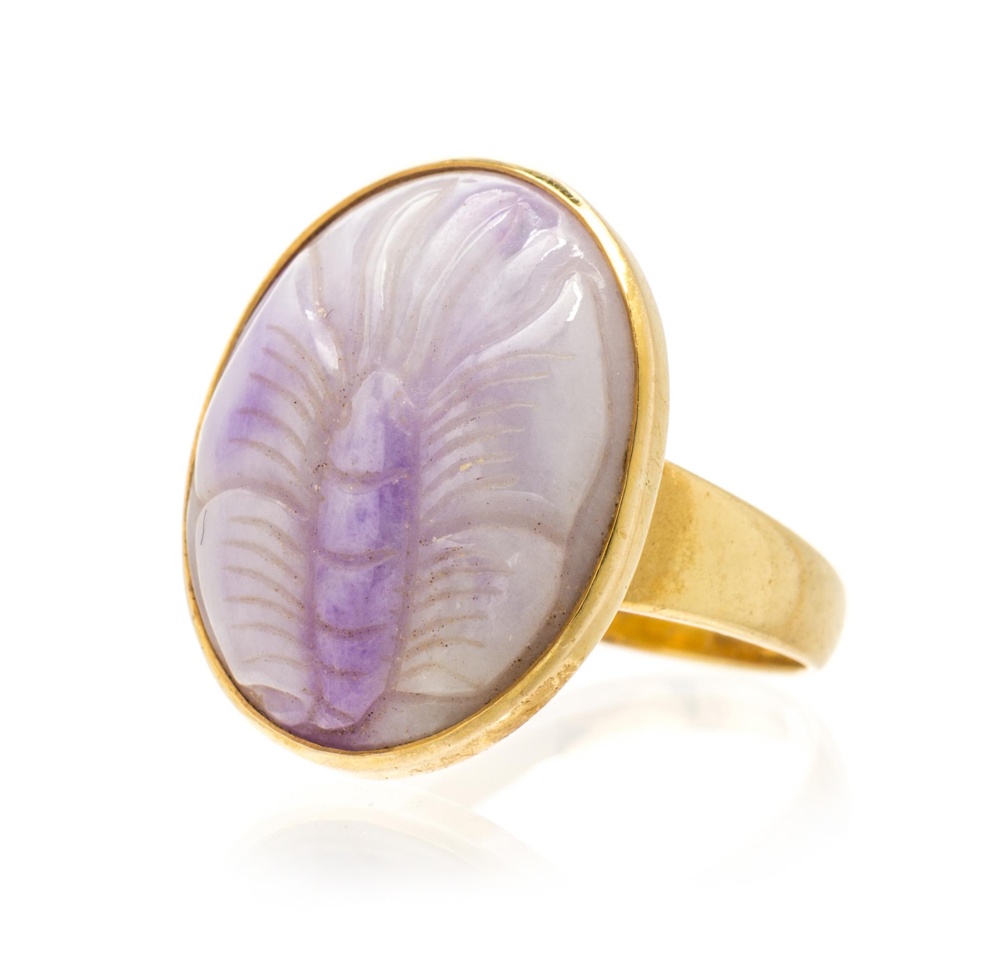 A 14 Karat Yellow Gold and Lavender Jade Ring, 6.80 dwts.
