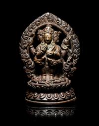 A Rare Tibetan Bronze Figure of Red Jambhala