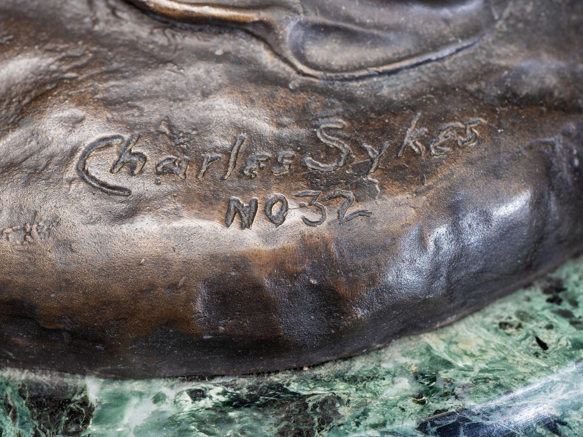 Spirit of Ecstasy with associated base