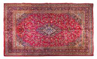 A Kashan Wool Rug 13 feet x 9 feet 6 inches. — 20TH CENTURY