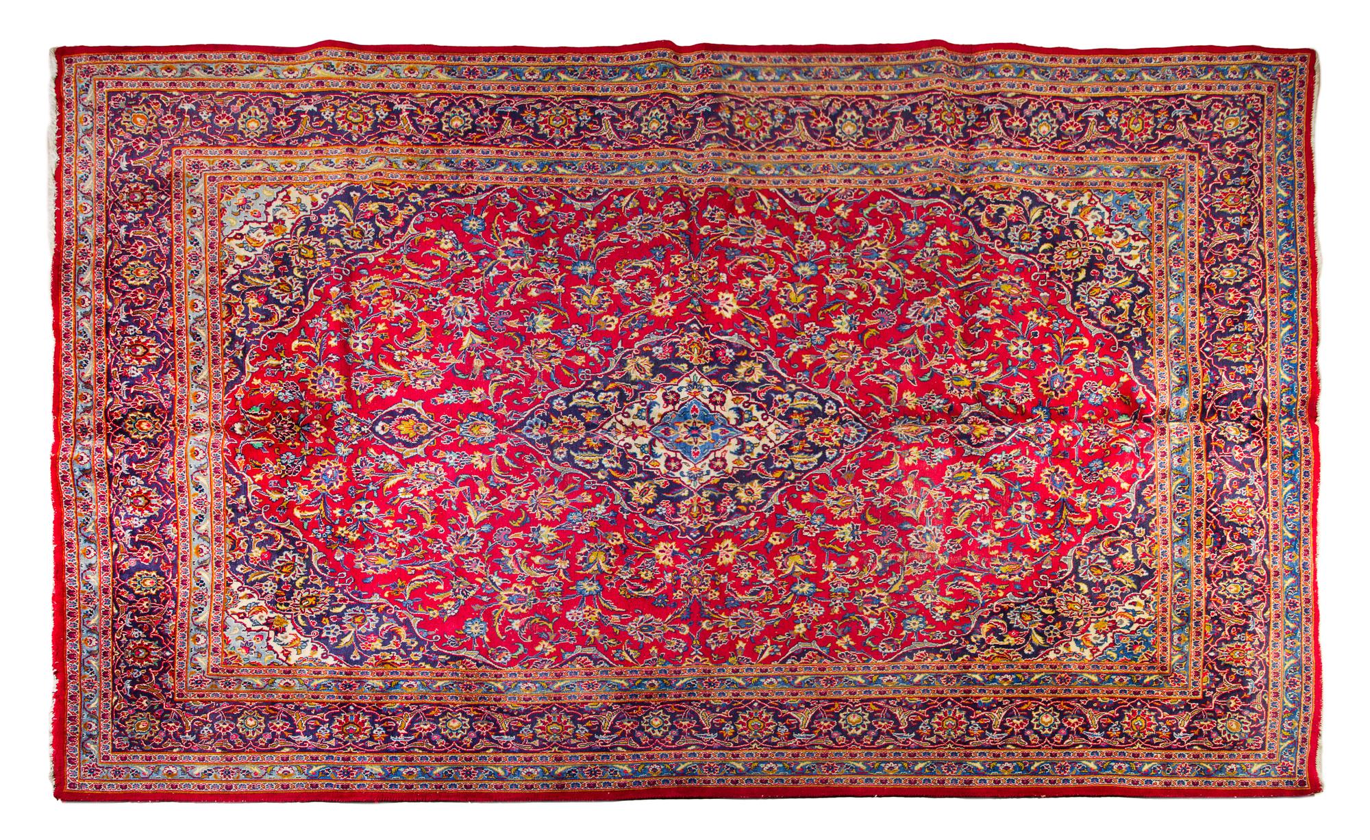 A Kashan Wool Rug 13 feet x 9 feet 6 inches. — 20TH CENTURY