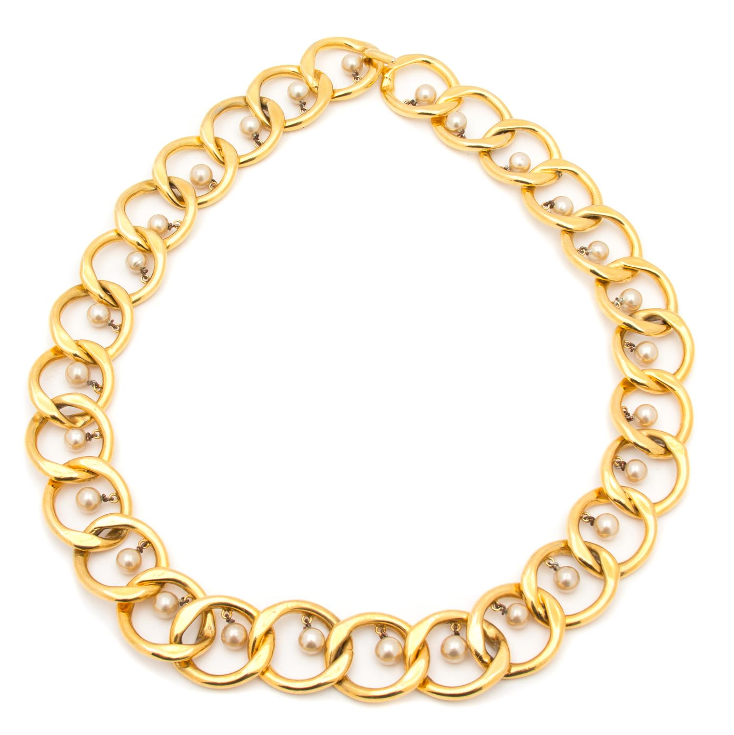 A Chanel Goldtone and Faux Pearl Link Belt, 31.5" x 1.5".