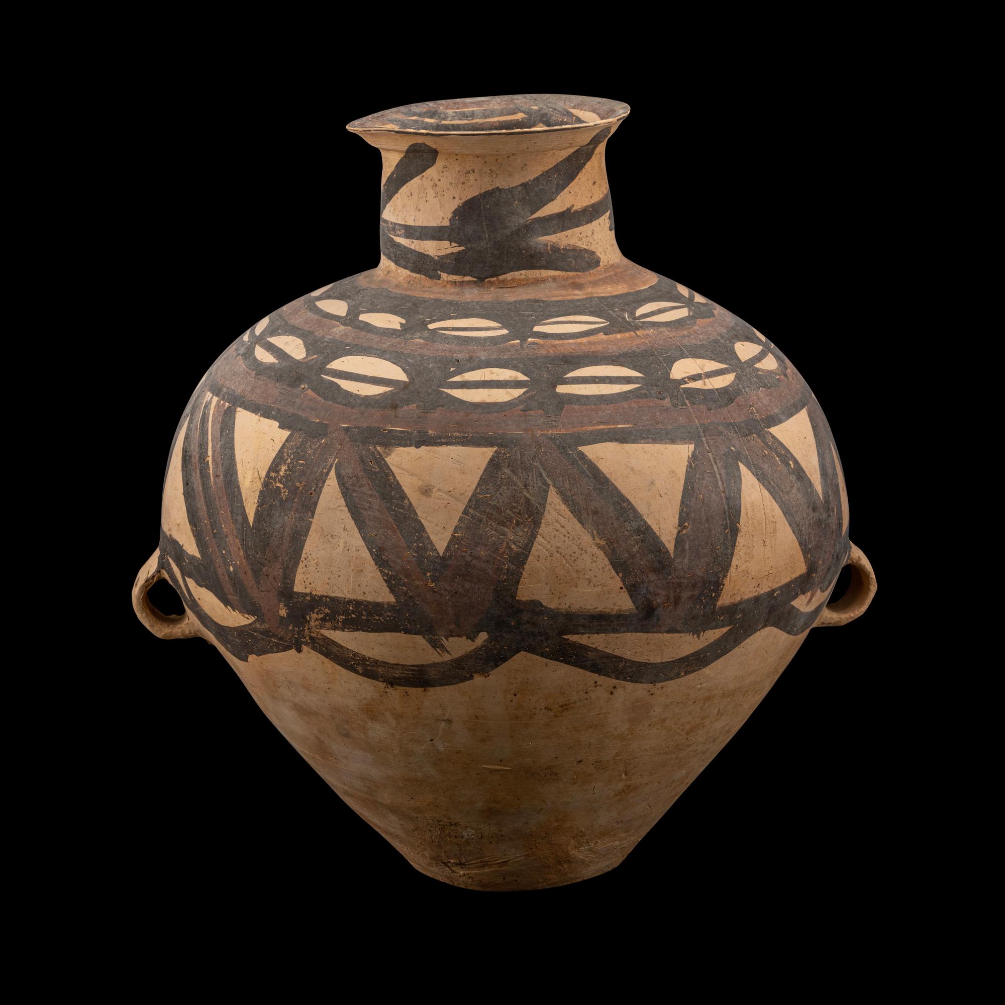 A Chinese Painted Pottery Handled Jar