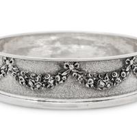 A Pair of Greek Silver Bottle Coasters