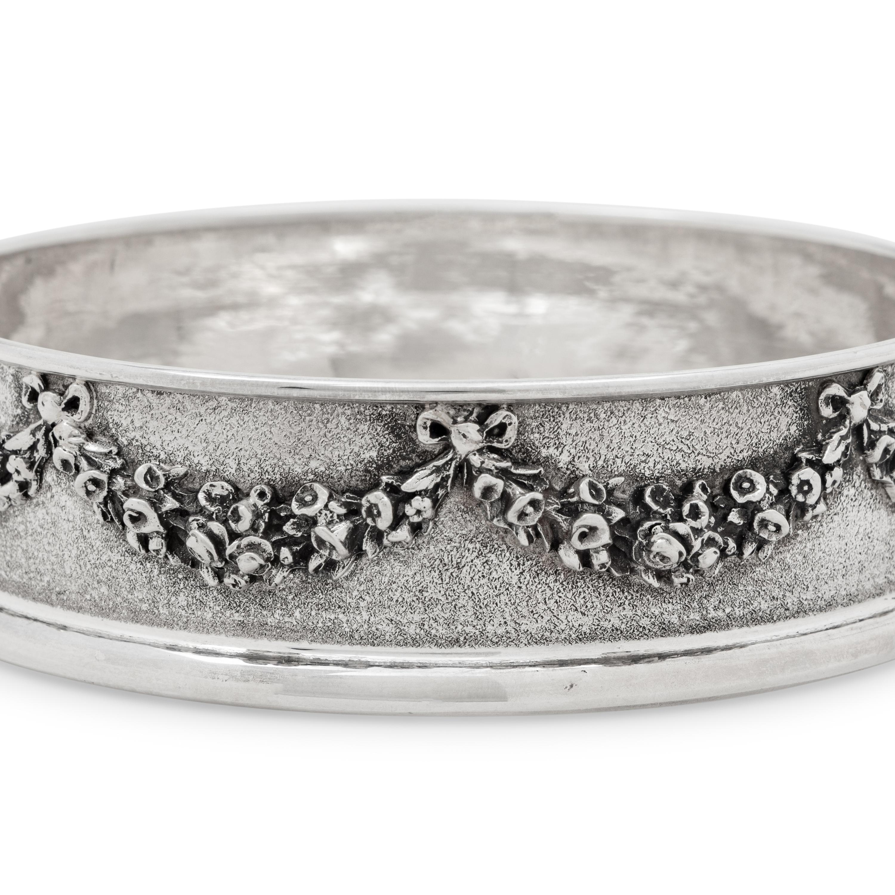 A Pair of Greek Silver Bottle Coasters