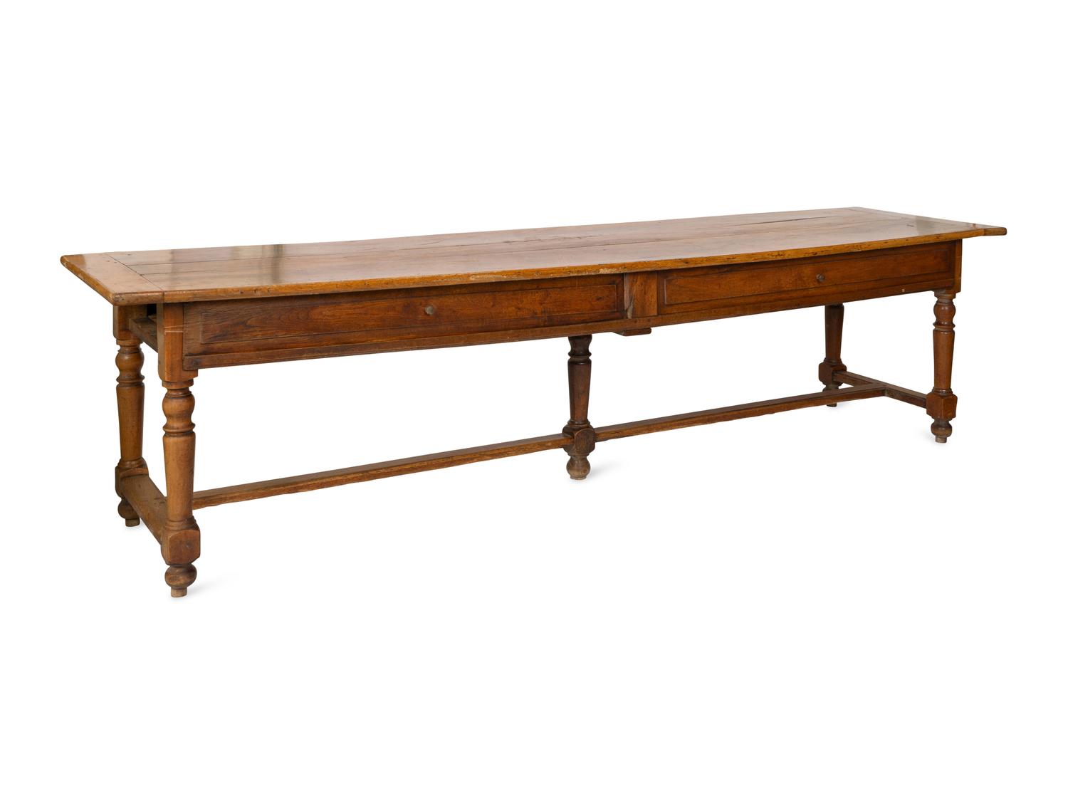 A Large Continental Fruitwood Refectory Table