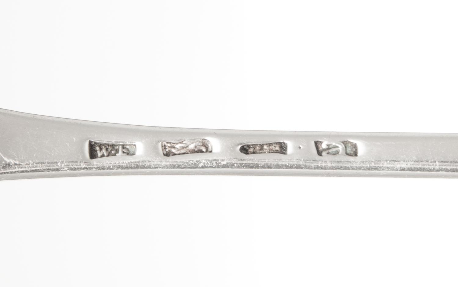 A Pair of George III Silver Serving Spoons, William Fearn, London, 1776, the Old English handle with an engraved crest of a stag lodged