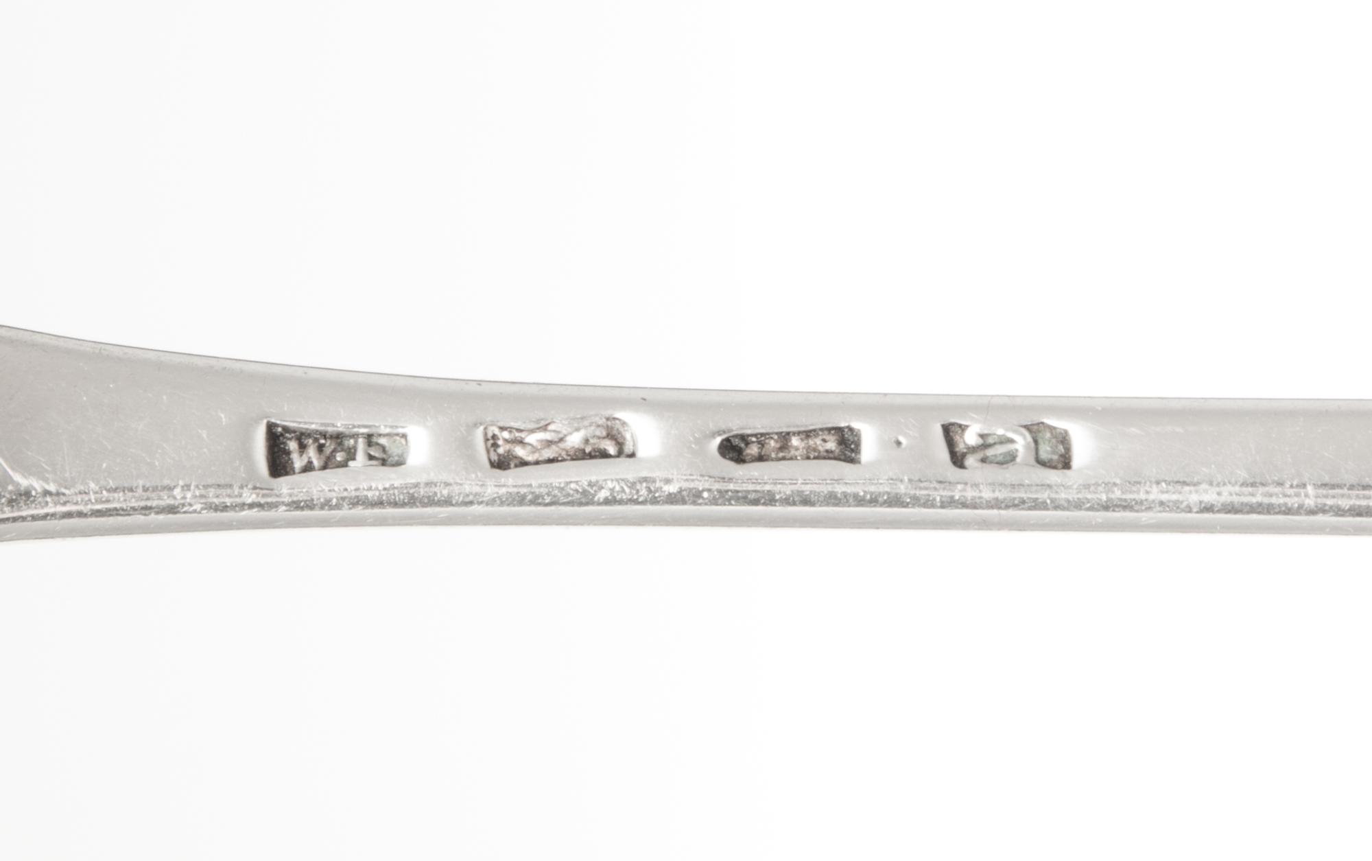 A Pair of George III Silver Serving Spoons, William Fearn, London, 1776, the Old English handle with an engraved crest of a stag lodged