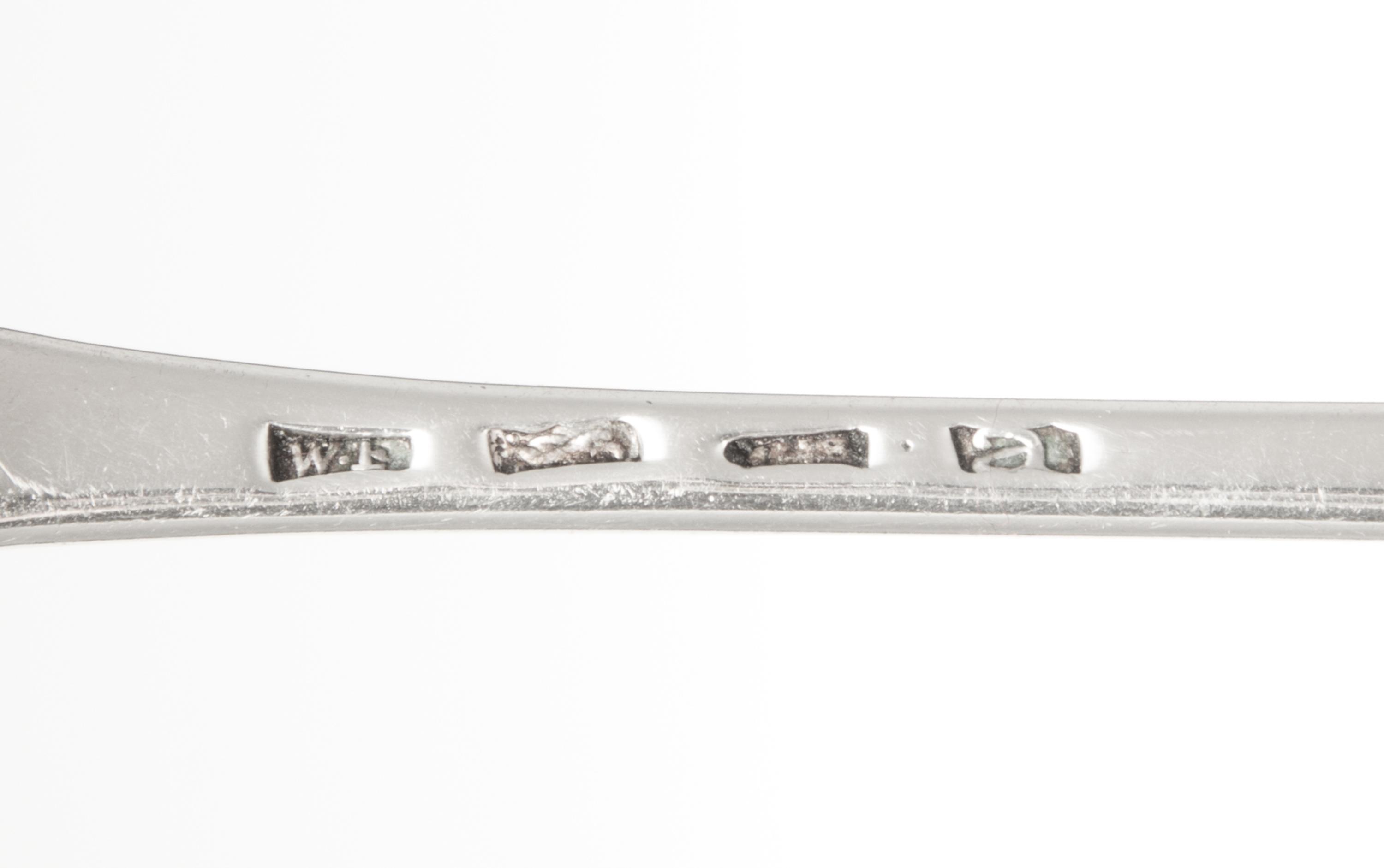 A Pair of George III Silver Serving Spoons, William Fearn, London, 1776, the Old English handle with an engraved crest of a stag lodged
