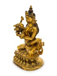 A Sino-Tibetan Gilt Bronze Figure of Vajradhara