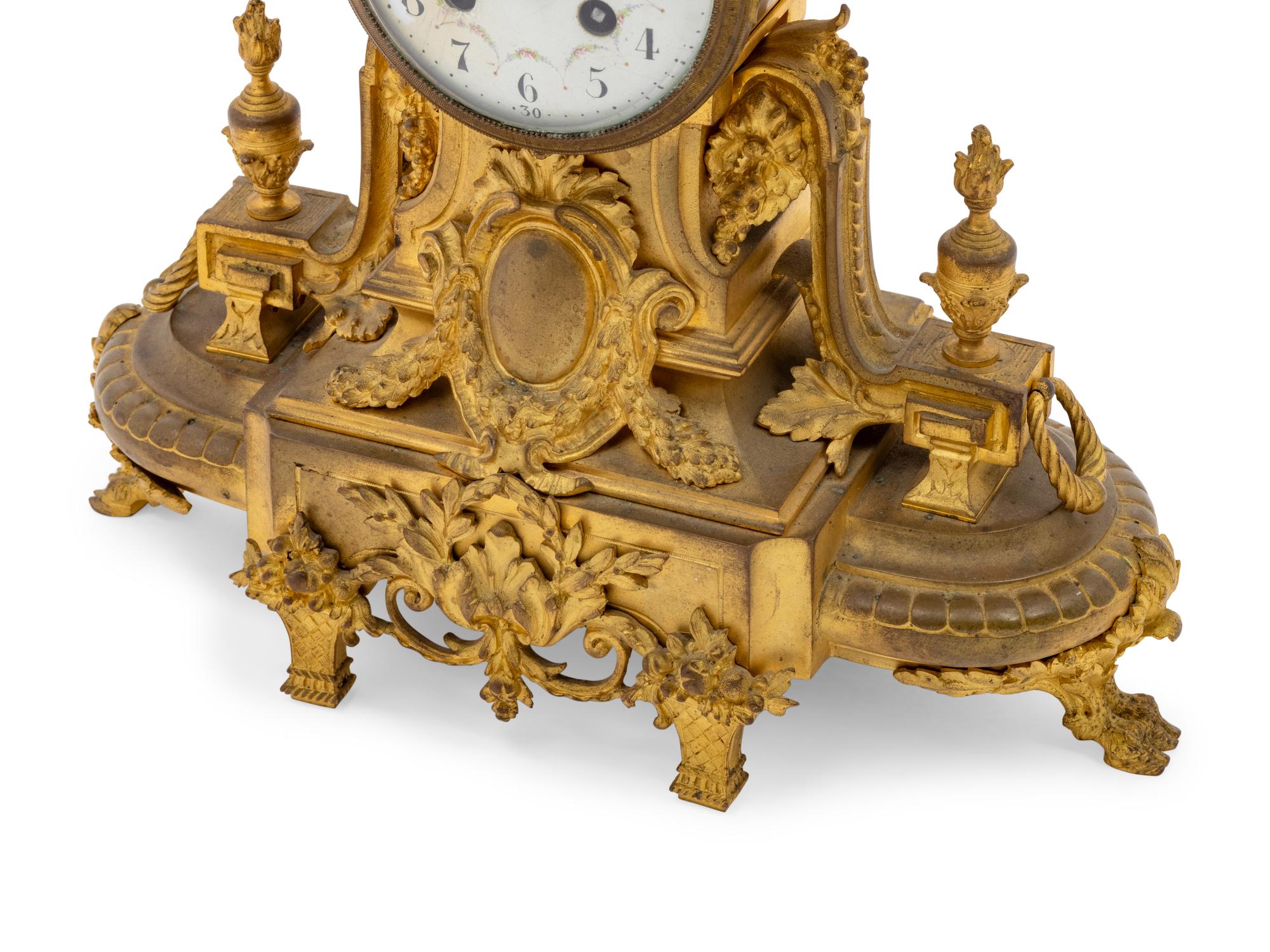 A French Gilt Bronze Figural Mantel Clock
