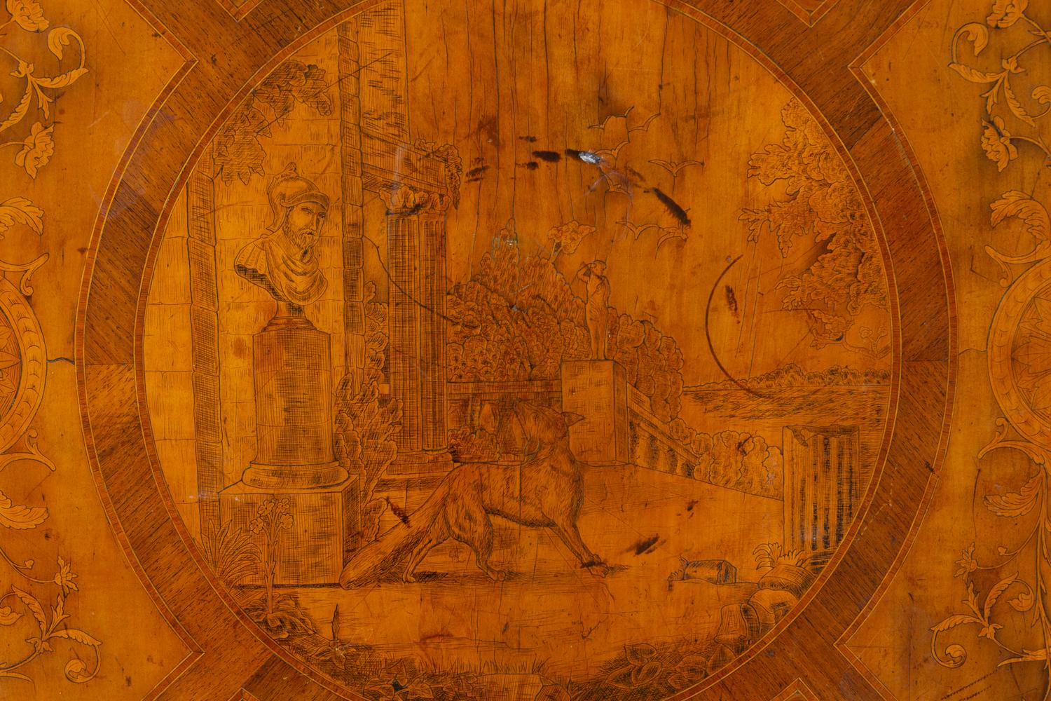 A Continental Marquetry Decorated Center Table