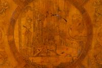 A Continental Marquetry Decorated Center Table