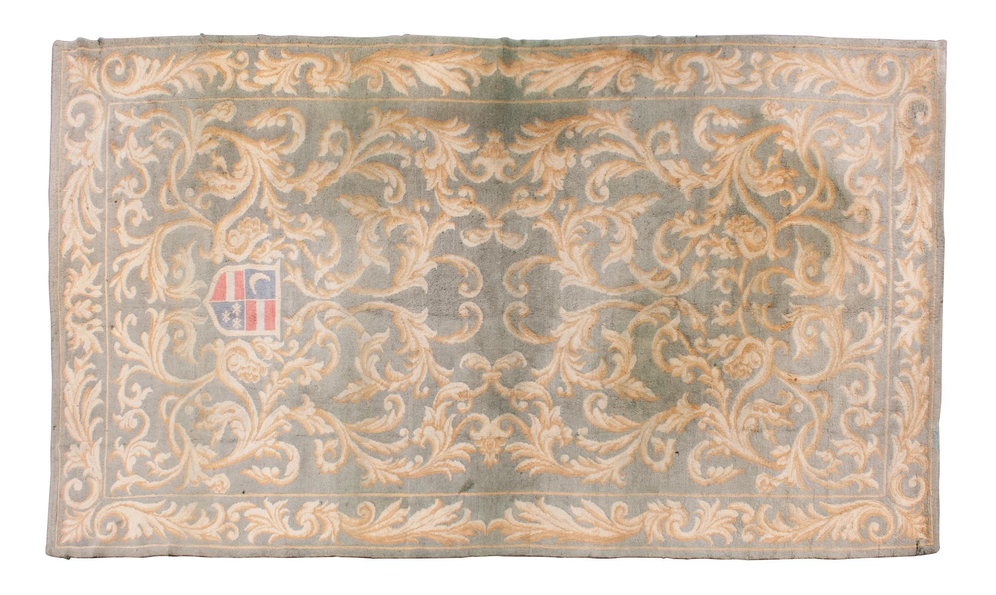 A Wool Rug 16 feet x 8 feet 9 inches. — 20TH CENTURY