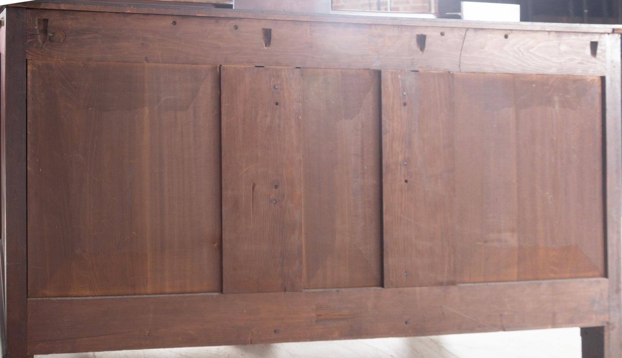 A Late Classical Carved and Highly Figured Mahogany Sideboard